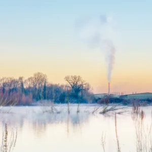 winter sunrise over the industrial lake