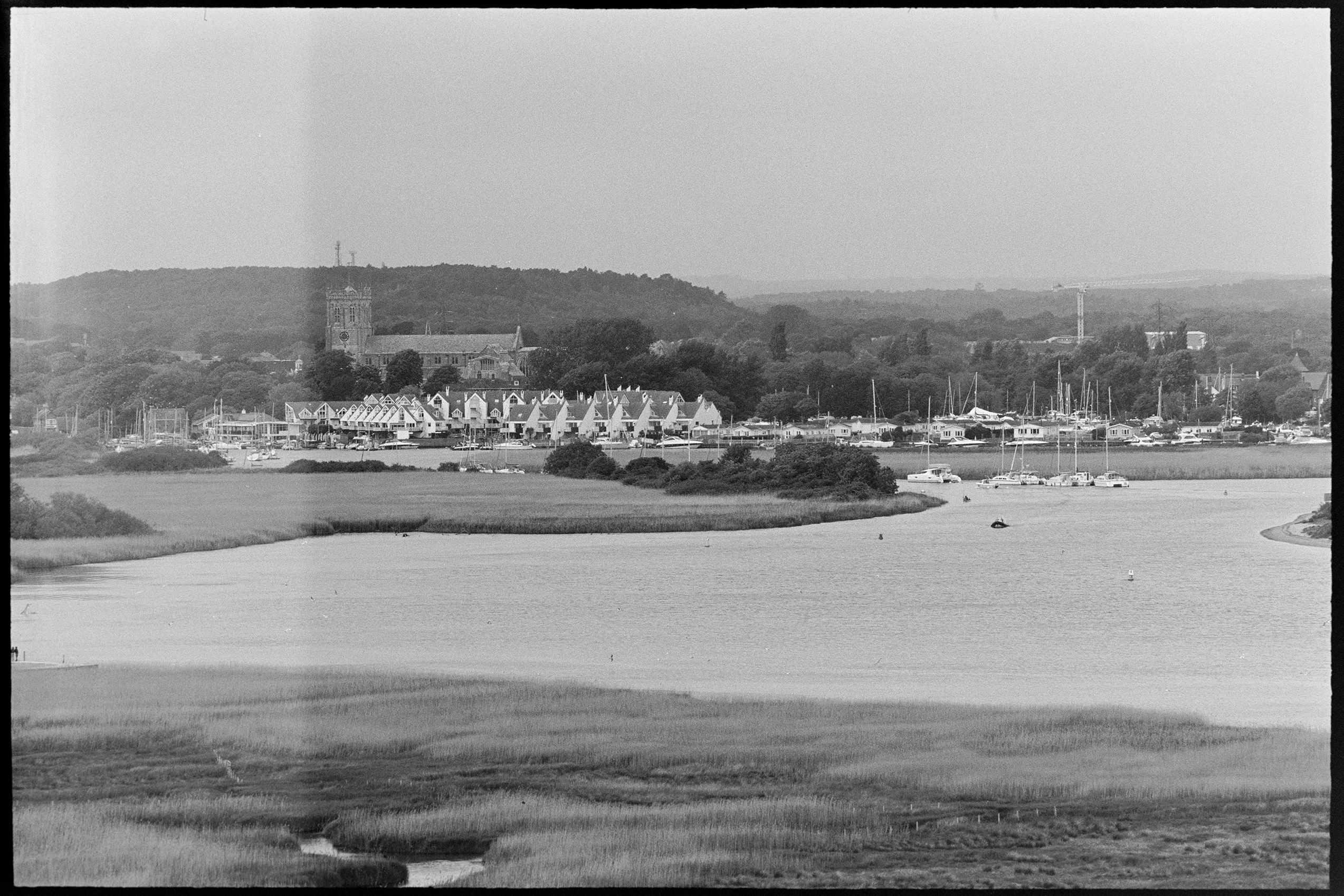 Coastal scene at Hengistbury Head captured on Earl Grey film with inconsistent exposure suggesting film camera malfunction