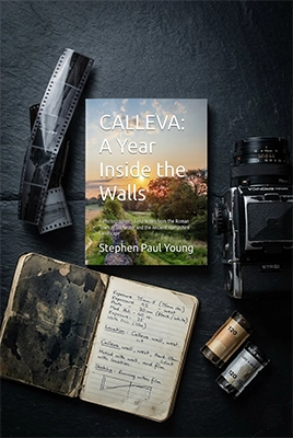 CALLEVA: A Year Inside the Walls — flat lay with Bronica ETRSi camera, film rolls and field journal