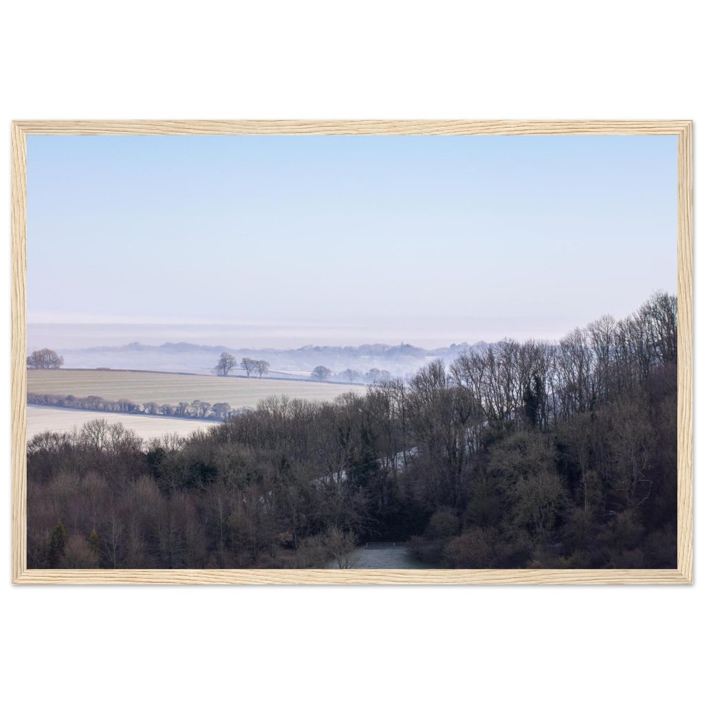 Watership Down beyond Barton Copse on a crisp spring morning, with mist resting over the landscape