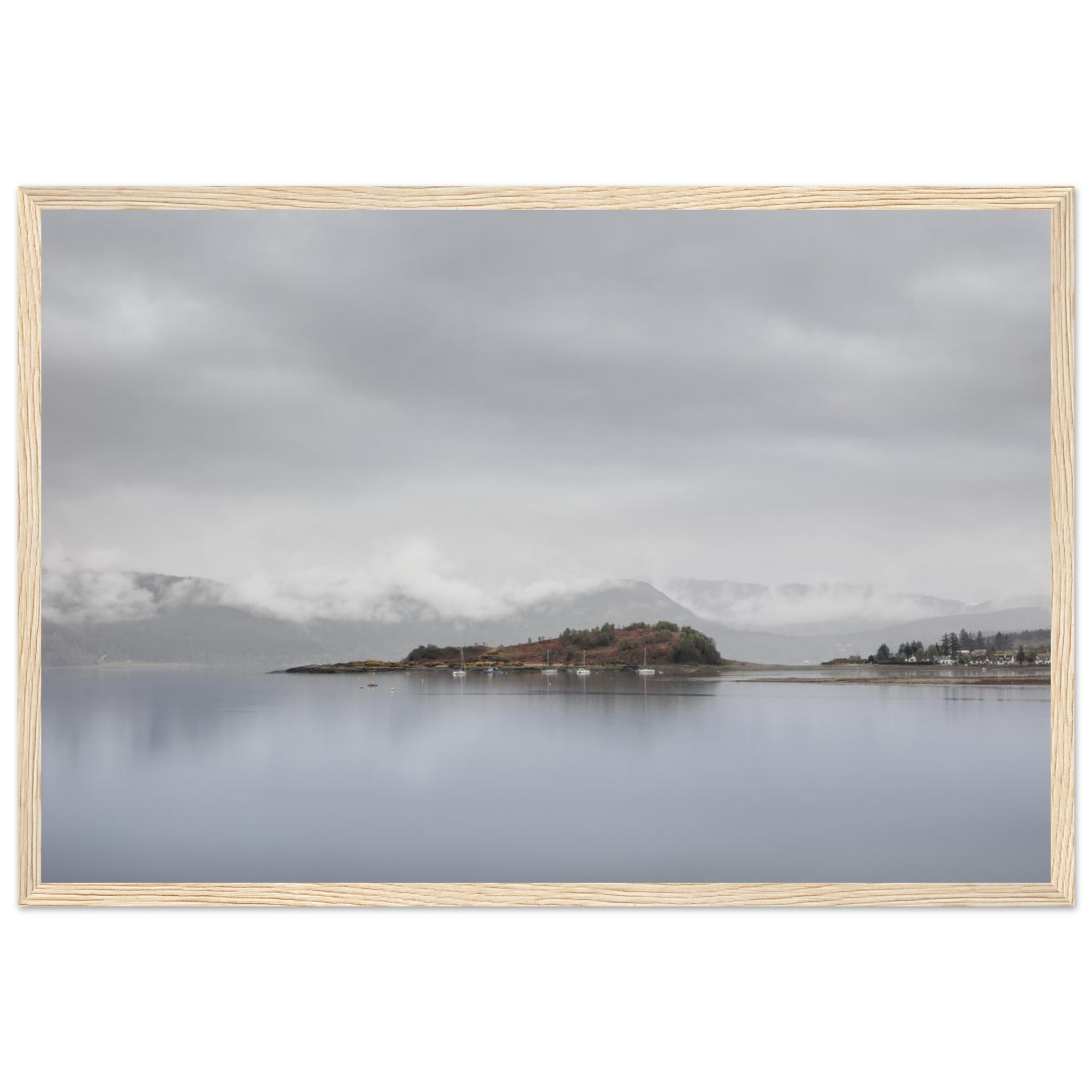 Lochcarron in the Scottish Highlands, with low cloud drifting over the loch and mountains fading into the distance